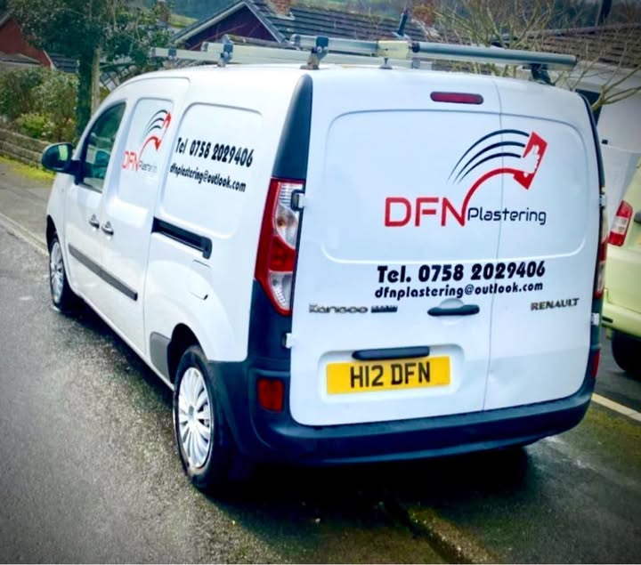 The white DFN Plastering van with the company logo and phone number