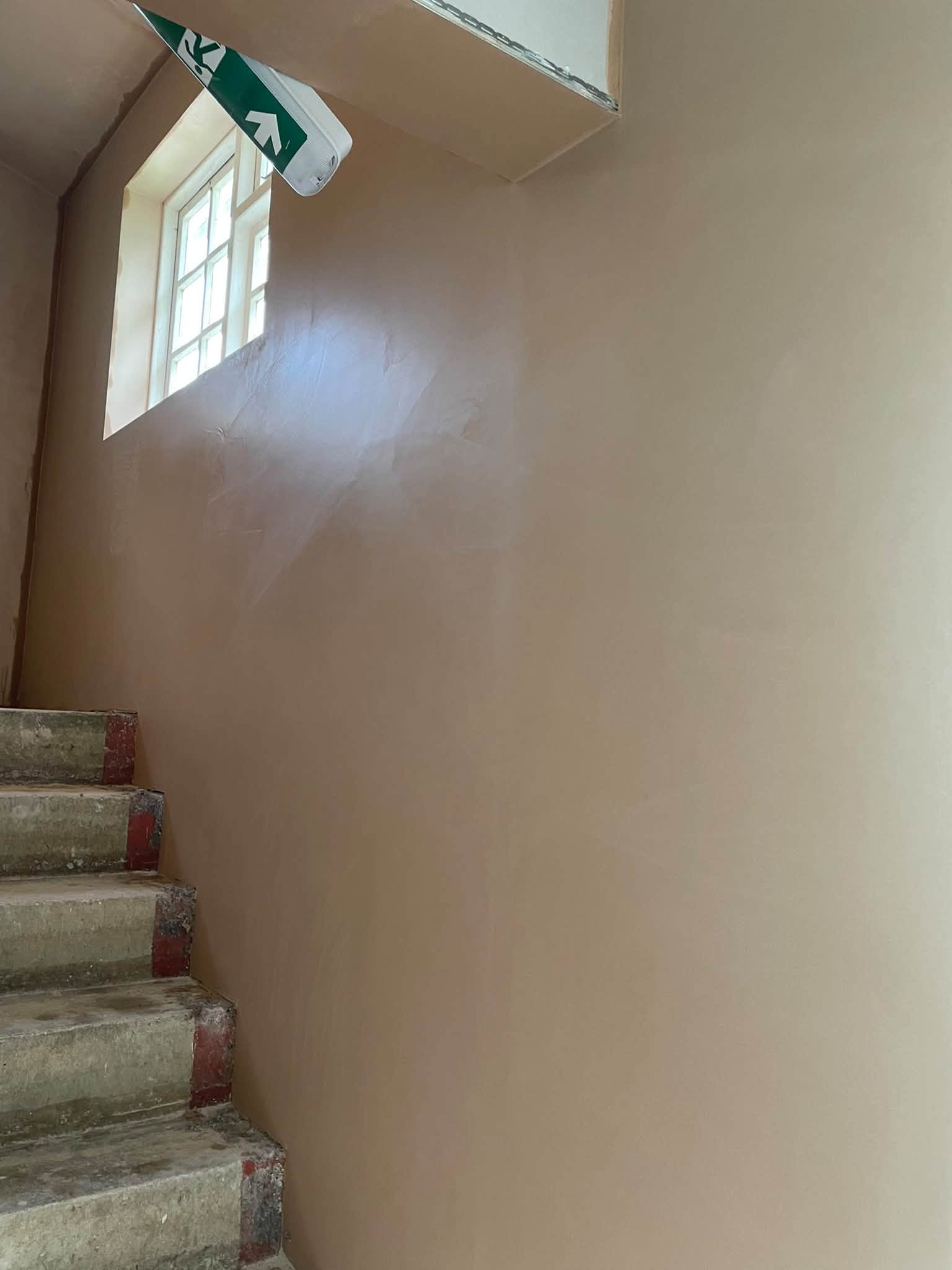 Stairwell walls freshly plastered