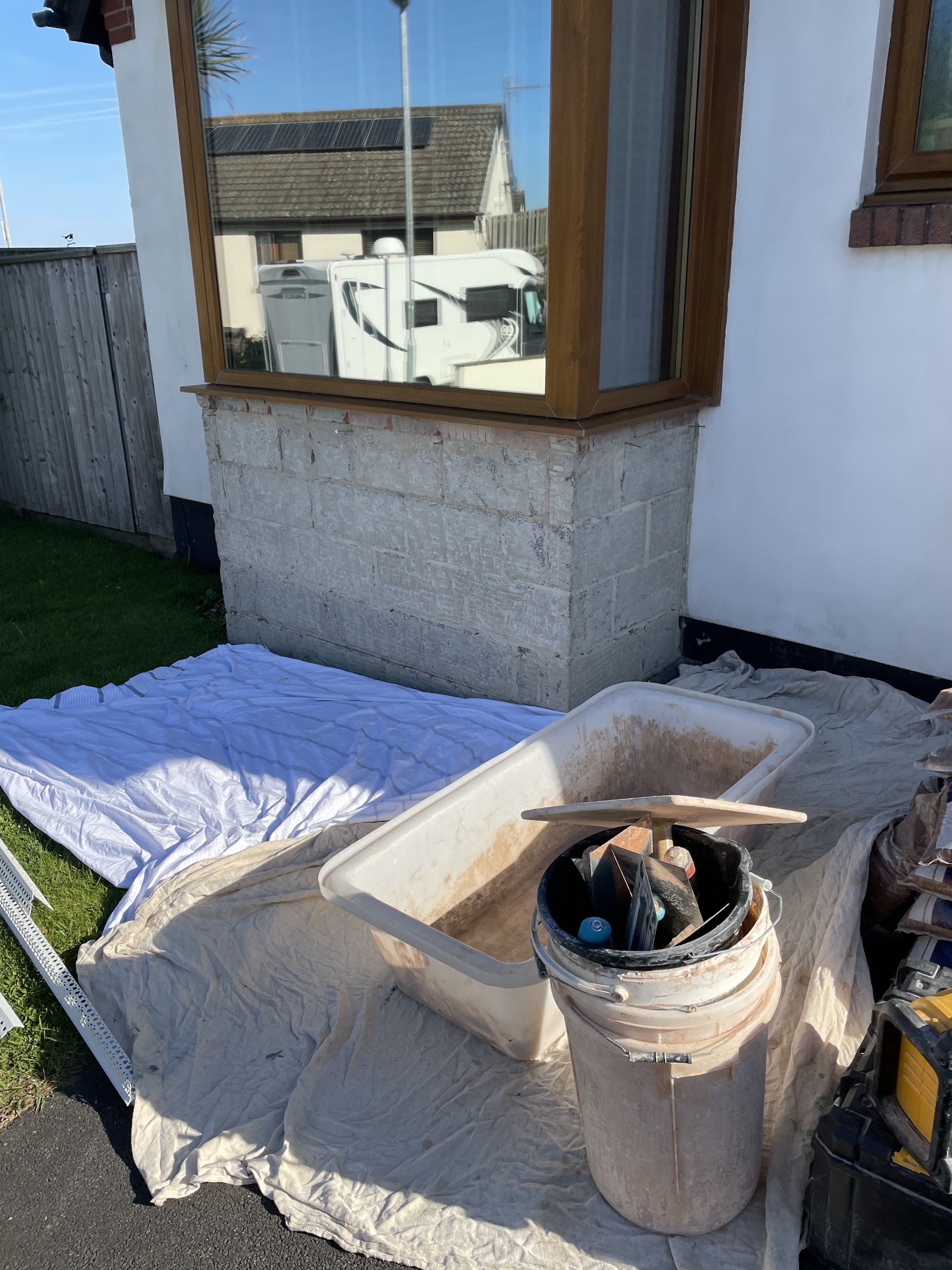 Bay wall in bare blockwork before rendering