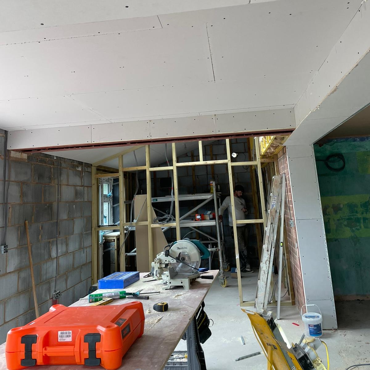 Extension with a new timber stud wall during the job